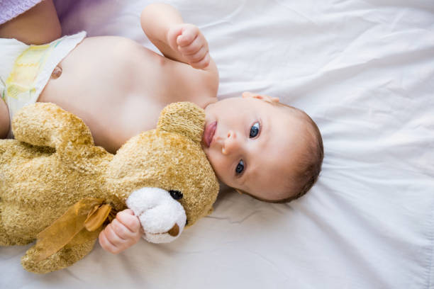 istock Baby lying on baby bed 656204672