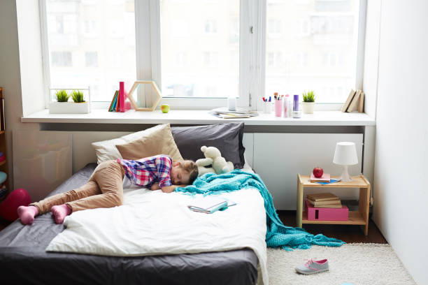 istock Girl sleeping on bed 656210634