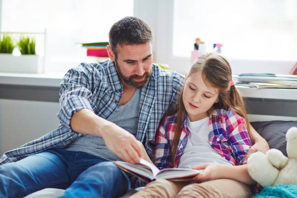 istock Lovely family doing homework 656210858