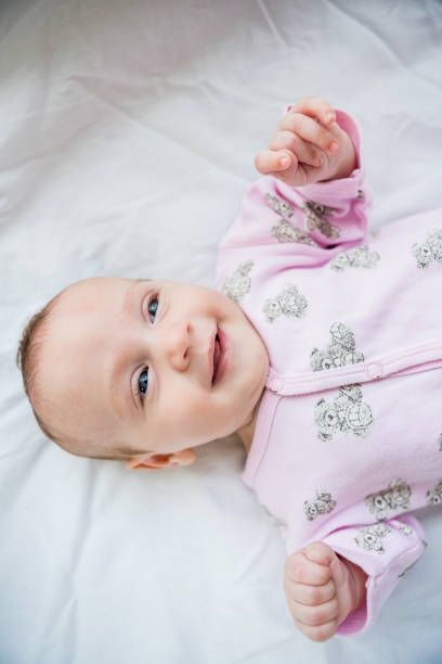 istock Cute baby boy relaxing on bed 656217548