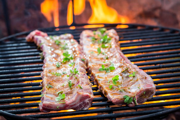 istock Hot ribs on grill with thyme and spices 656227410