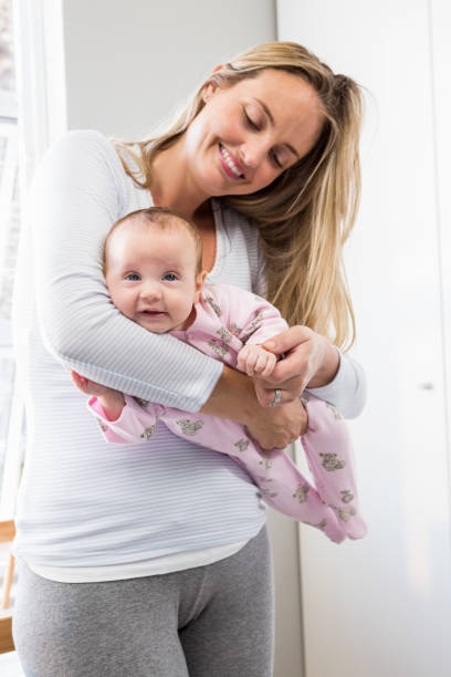 istock Mother holding her baby boy 656234514