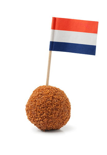 Single dutch traditional snack bitterbal with a dutch flag  on white background
