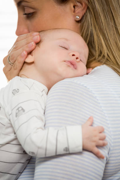 istock Mother holding and embracing her baby boy 656235194
