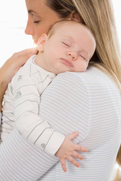 istock Mother holding and embracing her baby boy 656235354
