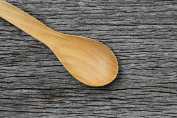 istock Wooden spoon on brown wood floors. 656238574