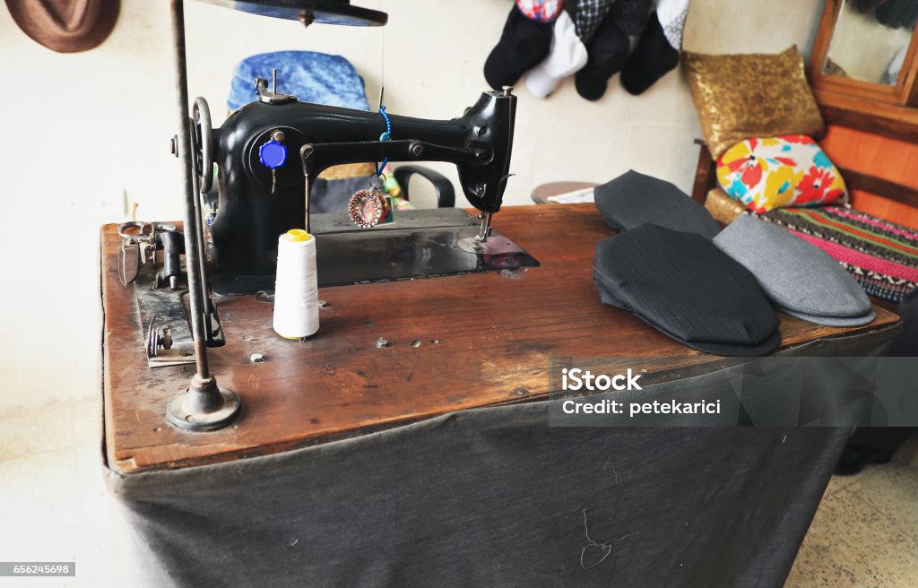 Traditional hat manufacturing shop Traditional, hat ,manufacturing ,shop,Midyat , handcrafted ,sold ,world,sewing machine,made, Midyat, Mardin Province ,Turkey. Yazidi Stock Photo