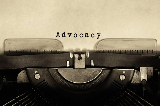 Advocacy word typed on vintage typewriter Word typed on vintage typewriter retro style. legal defense photos stock pictures, royalty-free photos & images