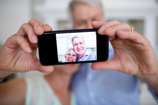 istock Senior couple taking selfie on mobile phone 656253370