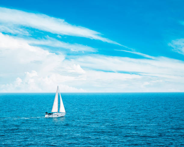 istock White Yacht Sailing in Blue Sea. Beautiful Clouds. 656260718