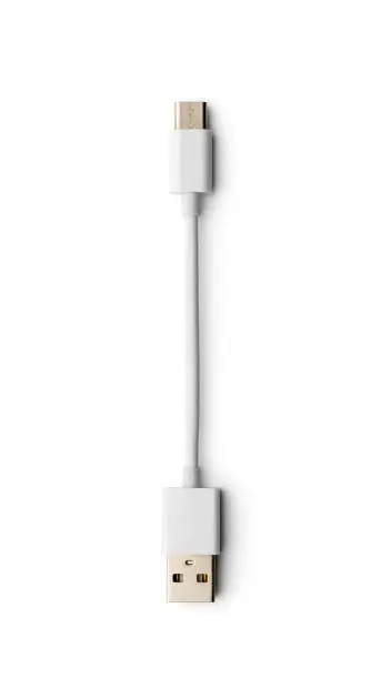 Photo of White charging cable for modern smartphone isolated on white