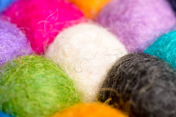 istock color wool background - balls of synthetic wool yarn - geometric rainbow pattern 656267932