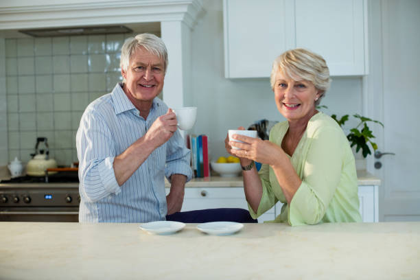 istock Senior couple having coffee at dining table 656271514