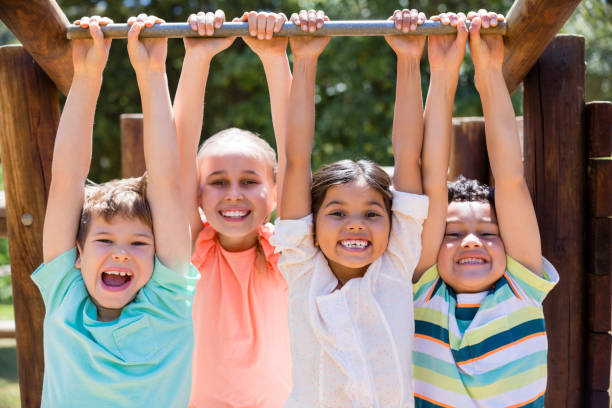 istock Kids playing together in park 656272246