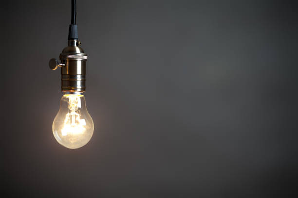 istock Vintage incandescent light bulb on grey background 656279822