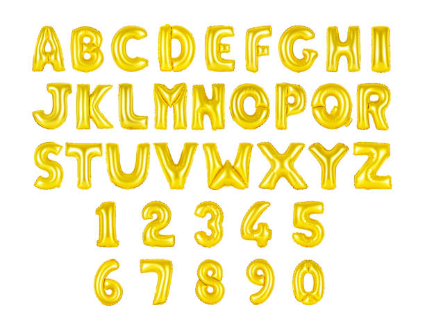 istock English alphabet and numerals golden color 656285810