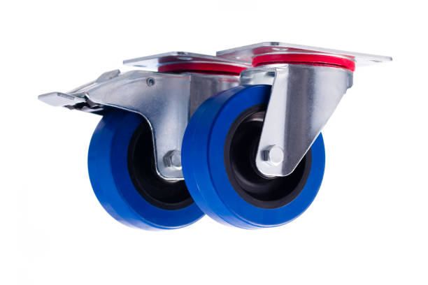 istock Industrial steel casters alined isolated on white background 656304868