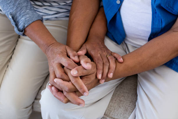 istock Senior couple holding each others hands 656305564