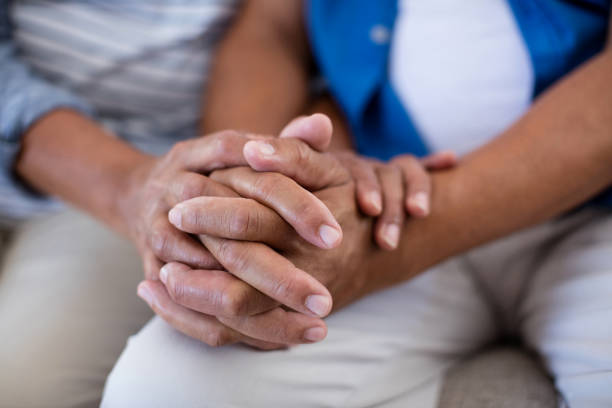 istock Senior couple holding each others hands 656305592