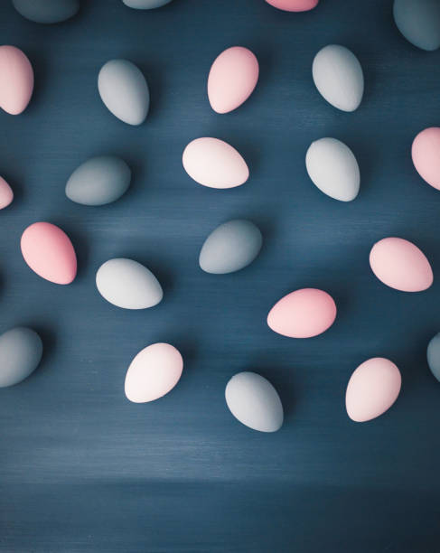 istock Hand painted gray and pink ombre Easter eggs background 656314982