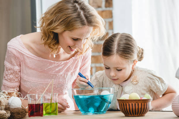 istock Woman and girl preparing for Easter 656316268