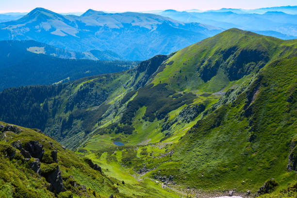 istock Amazing mountain gorge among the green alpine meadows 656319312