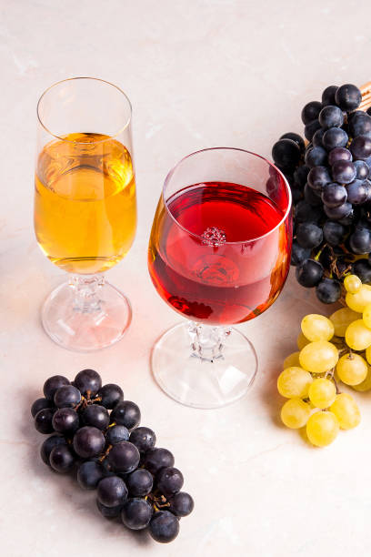 istock White and red wine in glasses 656325630