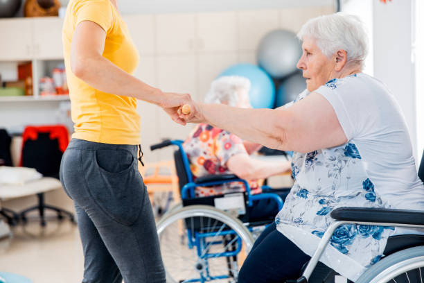 istock Senior Woman In The Retirement Community Having Physical Therapy 656325854