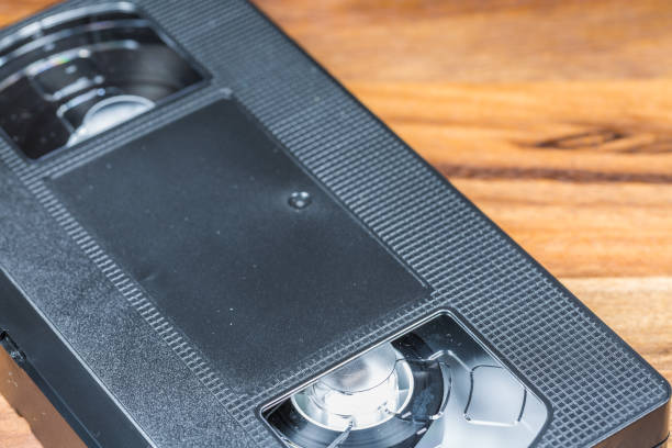 istock Video Cassette on Wooden Table 656328258