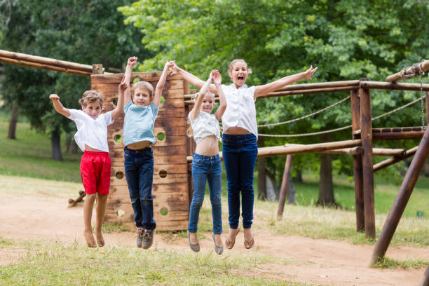 istock Kids having fun together in park 656328932