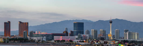 Las Vegas Hotel Casino Buildings Panorama at sunset Las Vegas, USA - March 15,2017: Panoramic view of Buildings of Las Vegas Hotel & Casino buildings at sunset. Las Vegas is one of the most popular travel destinations in the world and famous for entertainment and live  night show. Located about 5 hours east of Los Angeles. las vegas metropolitan area luxor luxor hotel pyramid stock pictures, royalty-free photos & images