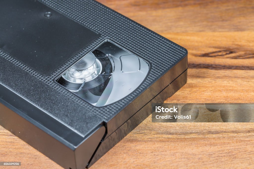 Vintage Video Cassette on Wooden Background Old Video Cassette on Wooden Table Background Collection Stock Photo