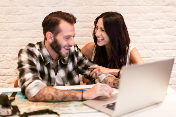 istock Young couple in love planning a trip 656336676