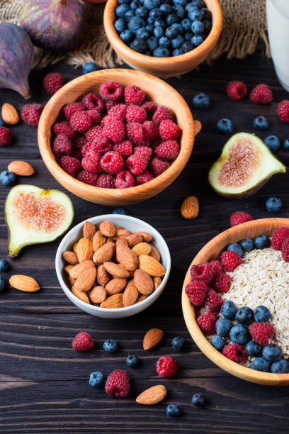 istock Breakfast table with porridge oats, berries and nuts 656342432