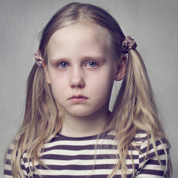 Portrait Caucasian little teen girl daughter child kid European teenager schoolgirl at home indoors calm serious positive looking at camera portrait childcare health custody pediatric health family. High quality photo