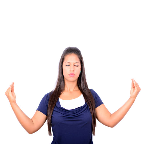 istock Young girl meditating over white background 656346102