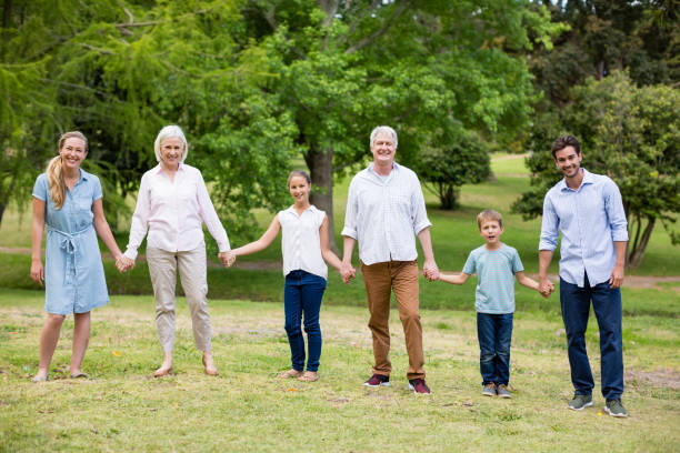 istock Multi-generation family enjoying together in park 656349784