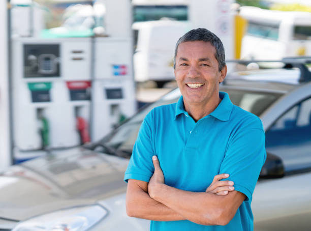 istock Man refueling his car at a gas station 656353198
