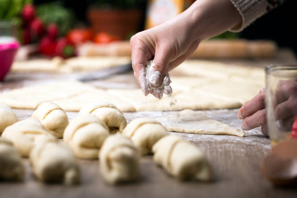 der rolls - bread kneading making human hand stock-fotos und bilder