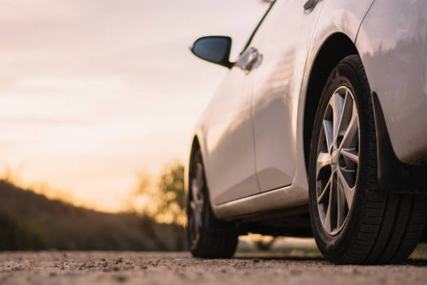 istock Countryside road and car 656357156