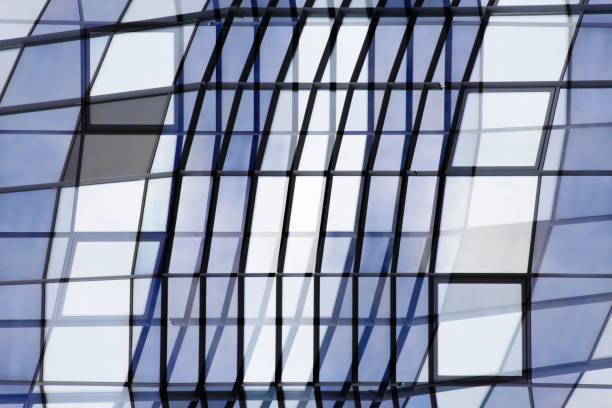 istock Grid structures in modern architecture. Reworked photo of building fragment with matte glass walls. 656362936