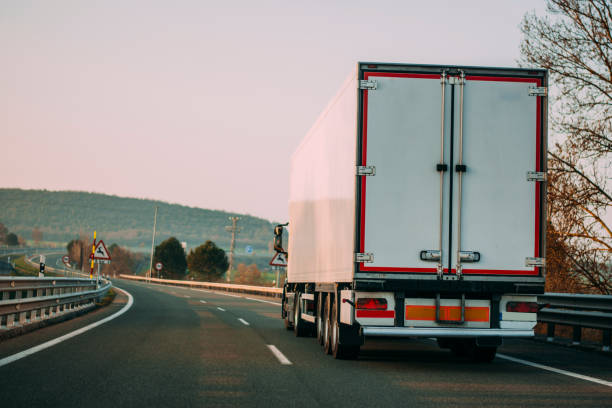 istock Truck on a highway at sunset 656363306