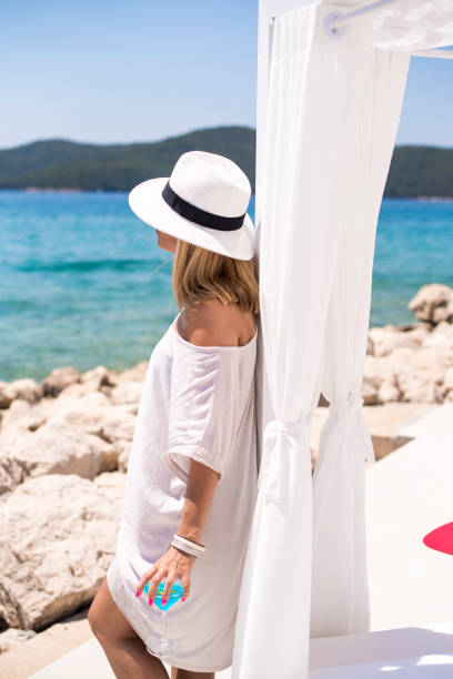 istock Woman by the  sea 656365134