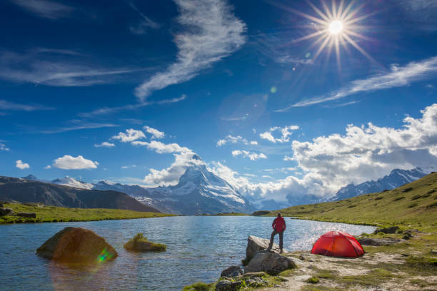 istock Mountain camping at sunny day with view to Matterhorn 656367380