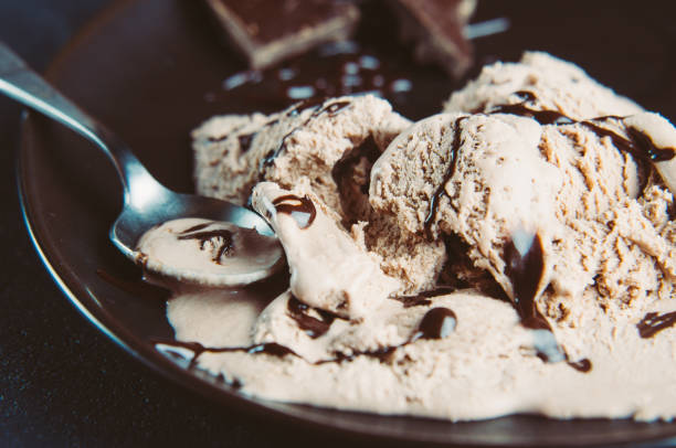 istock Chocolate ice cream on a dark plate 656371104