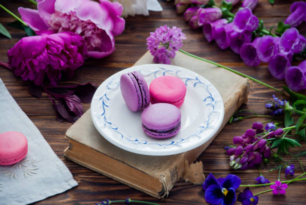 istock Purple and pink flowers and macaroon 656380652