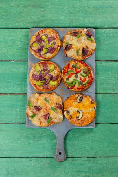 istock Various delicious italian pizza served on pizza tray 656381772
