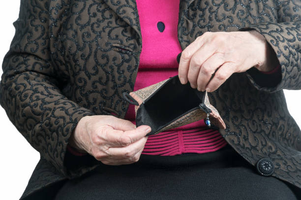 istock Empty wallet in hands of old woman 656381958