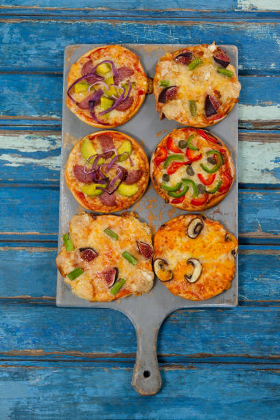 istock Various delicious italian pizza served on pizza tray 656382020