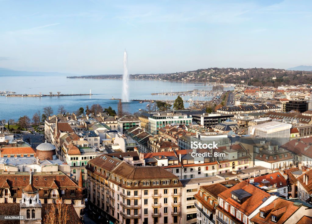 Geneva at Sunset, Lake Geneva, Switzerland Aerial view of Geneva, Lake Geneva with famous fountain Jet d´Eau are seen in the background, Switzerland, 60 megapixel image, horizontally stitched composition. Geneva - Switzerland Stock Photo